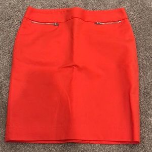 Bright orange skirt